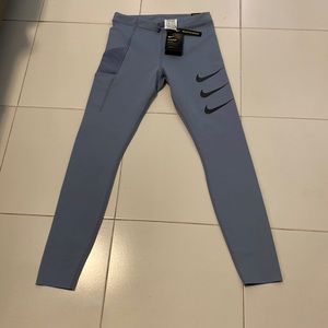 NIKE Power brand new with tags Epic Luxe tight fit.